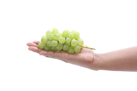 Grapes on human handの写真素材