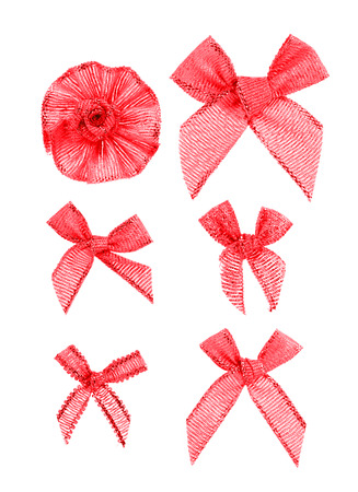 Festive red bows made of ribbon. Isolated on a white background.の写真素材