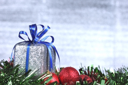 Christmas gift box & red christmas ballの写真素材