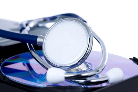 Medical concept, stethoscope with open DVD trayの写真素材