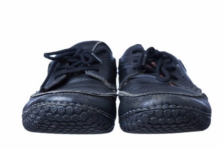 Pair of black leather shoes , isolated on white backgroundの写真素材