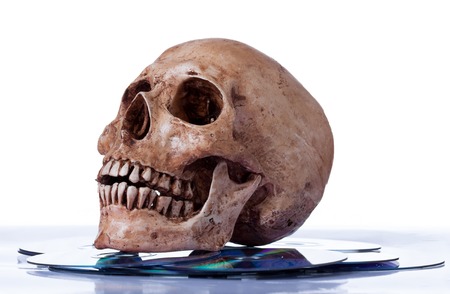 Human skull on dvdの写真素材