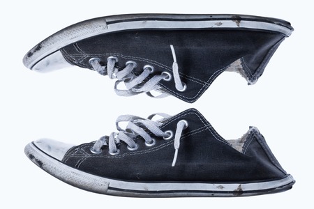 Old shoes, isolated on white backgroundの写真素材