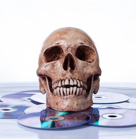 Human skull on dvdの写真素材