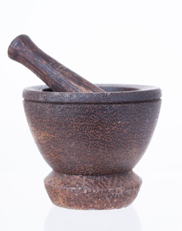 Wooden mortar and pestle. Symbol of pharmaceutical  for grinding pillsの写真素材