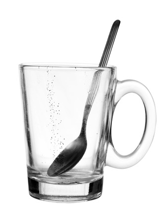 Empty coffee cup with spoon isolated on white  backgroundの写真素材