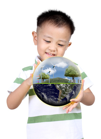 Little asia boy holding the earth over white background.(Knowledge concept), Earth globe image provided by NASAの写真素材