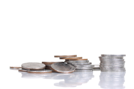 Coins on white background , isolated on white backgroundの写真素材