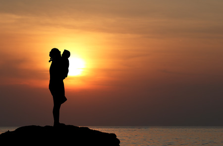 silhouette of family (mother and son)の写真素材
