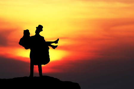 silhouette of miniature wedding bride and groom coupleの写真素材