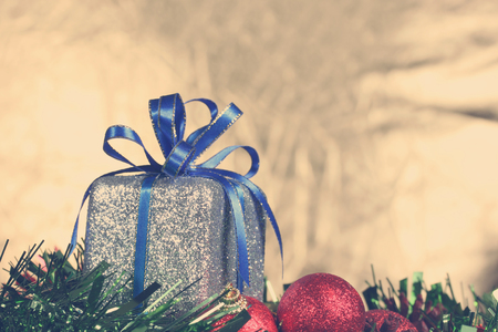 Christmas gift box & red christmas ballの写真素材