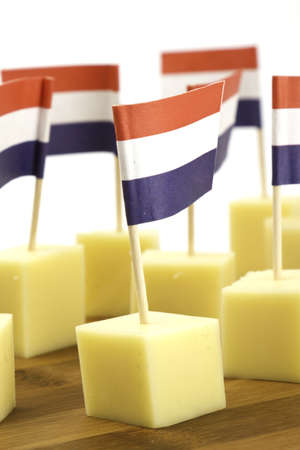 pieces of cheese with flagsの写真素材