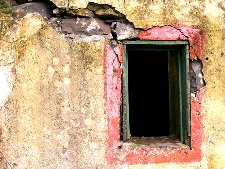 old ruined window in an abandoned house