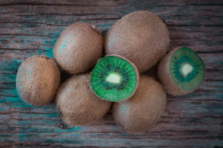 Kiwi fruit on wooden rustic table, ingredient for detox smoothieの写真素材