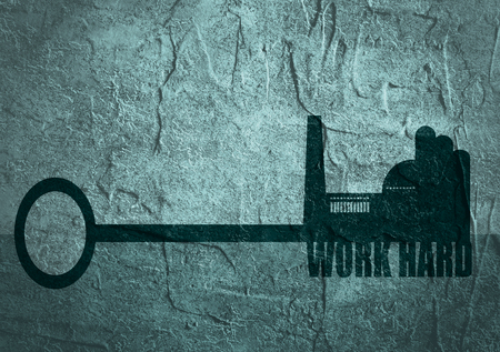 Flat design style modern illustration concept of hand holding a key of hard work. Factory icon and text on key. Concrete texturedの写真素材