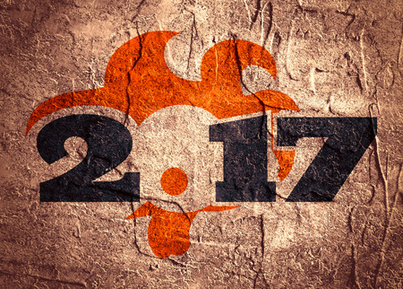 Image of an cock. Rooster icon as symbol of the 2017 new year. Textured by concrete