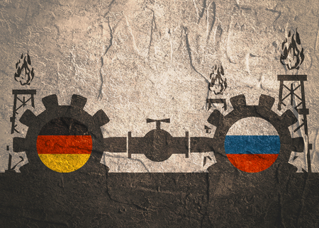 Image relative to gas transit from Russia to Germany . Gears connected by gas pipe. National flags on cog wheels. Concrete texturedの写真素材