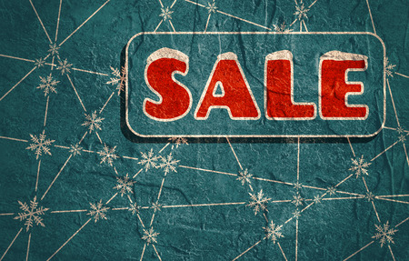 Sale inscription with snowflakes at the intersection of the lines. Retail business relative background. Grunge textureの写真素材