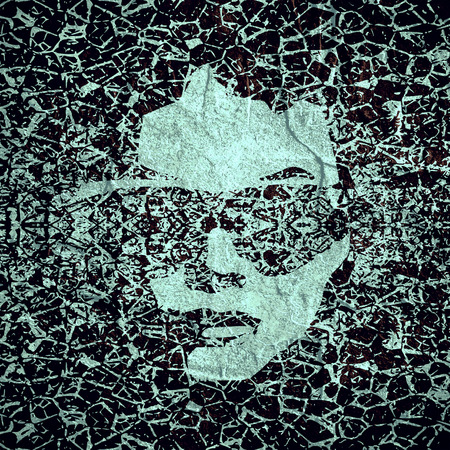 Portrait of beautiful woman in black sunglasses. Front view. Grunge cracked texture avatarの写真素材