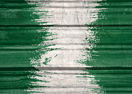Nigeria flag design concept. Flag textured by grungy wood pattern. Image relative to travel and politic themesの写真素材