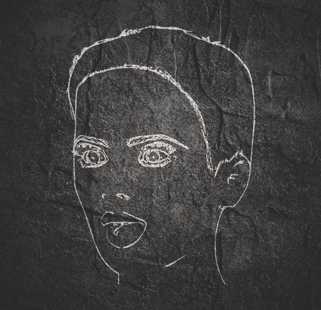 Face half turn view. Elegant outline silhouette of a female head. Portrait of a happy surprised womanの写真素材