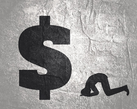Silhouette of man in prayer pose. Man and symbol of dollar currencyの写真素材