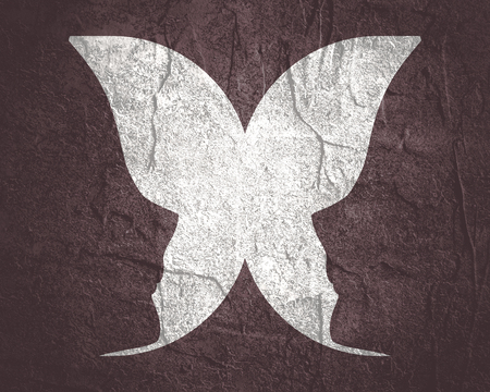 A butterfly or two face profile view. Optical illusion. Human head make silhouette of insectの写真素材