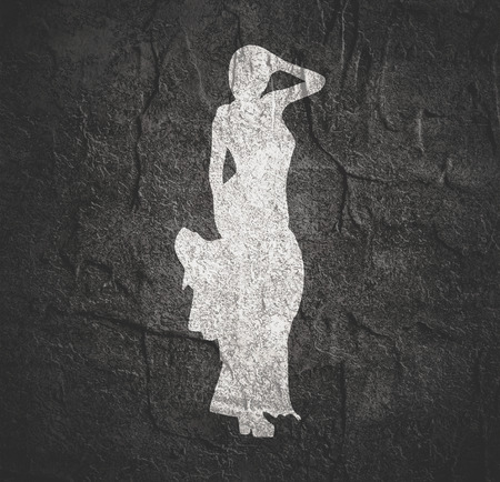 Sexy woman silhouette in evening dress. Lady rise her hand to headの写真素材