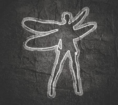 Young woman outline silhouette with wings of dragonflyの写真素材