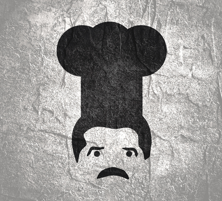 Chef in a cooking hat silhouette. Kitchen simple icon.の写真素材