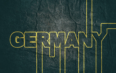 Image relative to Germany travel theme. Creative vintage typography poster concept. Neon bulbs lettersの写真素材