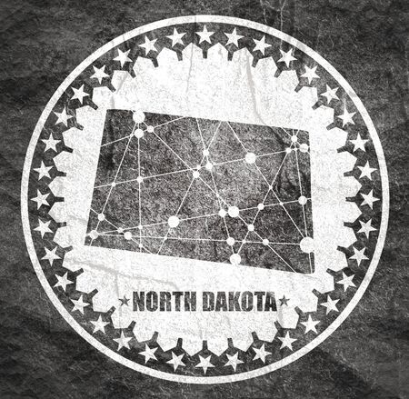 Image relative to USA travel. North Dakota state map textured by lines and dots pattern. Stamp in the shape of a circleの写真素材