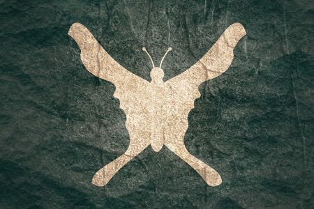 A butterfly or two face profile view. Optical illusion. Human head make silhouette of insectの写真素材