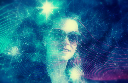 Attractive fashionable blonde. Huge glasses. Emotional face. Universe filled with stars. Double exposure effectの写真素材