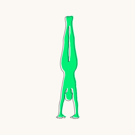 Sporty beautiful young woman working out, doing handstand. Yoga and fitness training theme