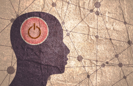 Switch button to turn on brain activity. Active mental, intellectual and thinking. Silhouette of head. Artificial intelligence and machine learning concept. Connected lines with dots.の写真素材