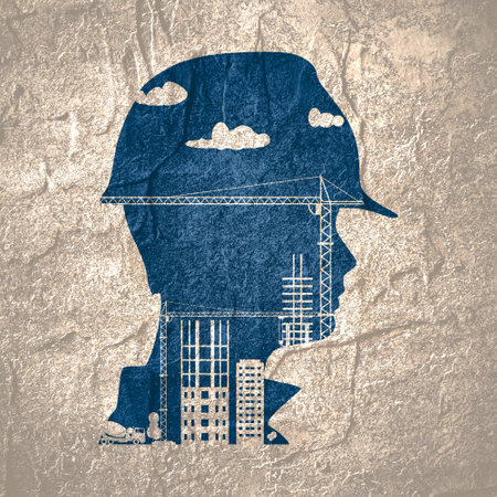 Portrait of man architect at building site. Confident construction manager wearing hardhat. Successful mature civil engineer at construction site. Project management, engineering and safety inspectionの写真素材