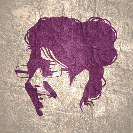 Silhouette of a female head. Beauty and fashion. Elegant silhouette of a young woman wearing spectaclesの写真素材