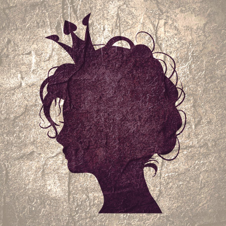 Profile view silhouette of a princess or queen. Cute girl portrait.の写真素材