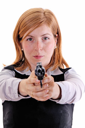 Woman with handgun isolated on whiteの写真素材