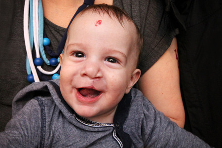 Happy babby is smiling