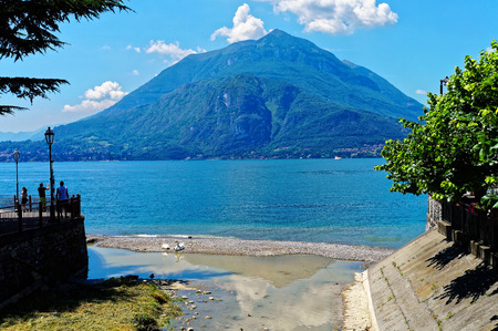 View of lake and a mountain in varennaの写真素材