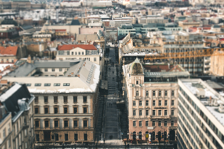 Street view with people walking between the old  houses, tilt-shift effectの写真素材