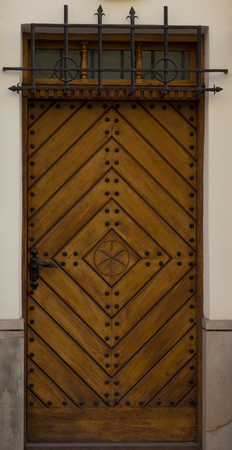 The vintage yellow  wooden front door of an old house-4の写真素材