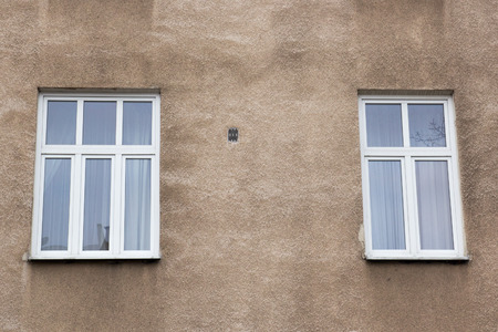 Two modern windows on the facade of the houseの写真素材