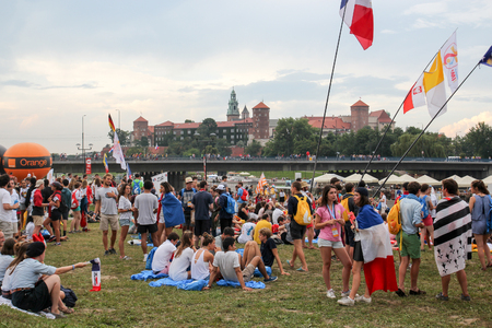 KRAKOW, POLAND -  2016 - World Youth Day 2016, A crowd of pilgrims on the background of the Wawel castleのeditorial素材