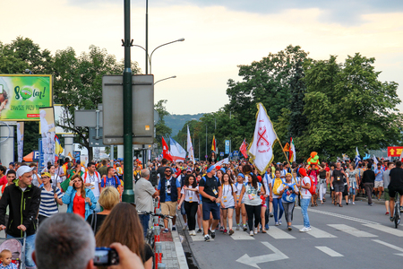 KRAKOW, POLAND -  2016 - World Youth Day A crowd of piligrims with flagsのeditorial素材