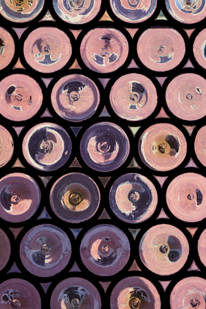 Abstract retro vintage purple background with abstract textured round pattern close upの写真素材