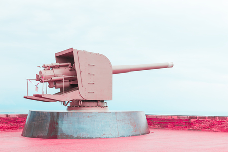 Old pink metal cannon, concept of peace and cessation of warの写真素材