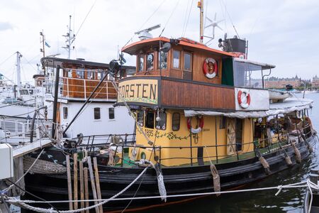 Stockholm, Sweden  - September 8, 2018 An old vintage wooden yacht is moored at the pierのeditorial素材